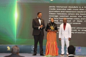 Jamila Mohamed receiving the award.